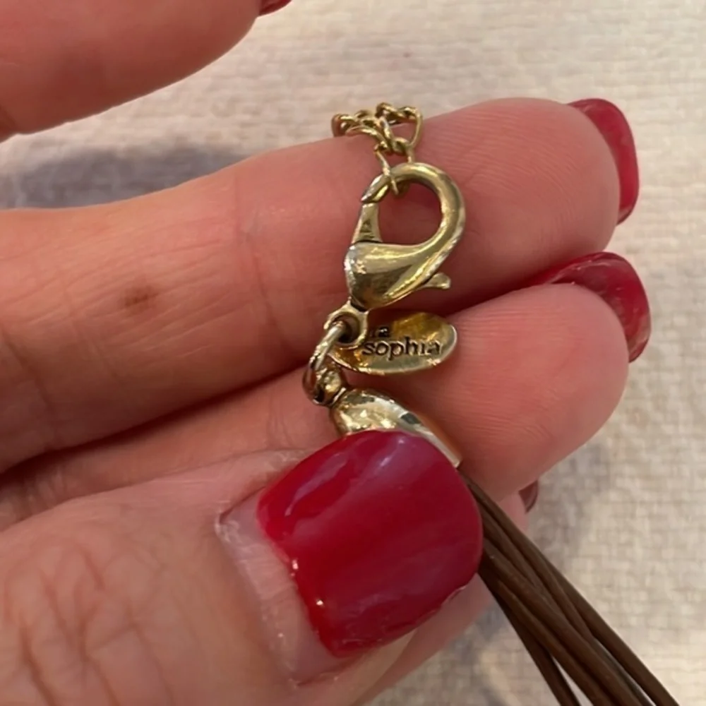 Lia Sophia Buona Sera amber pendant brown leather cord necklace